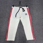TRUST SPORTS-Baggy Trousers for that Relaxed Look-white step.